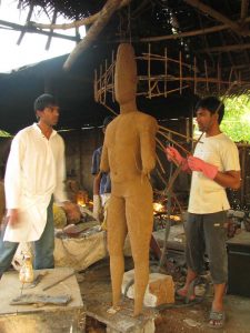 Varun and Varadaraj working on a wax model of Ravendra