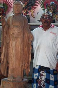 Wayan with unfinished 6 foot Buddha statue