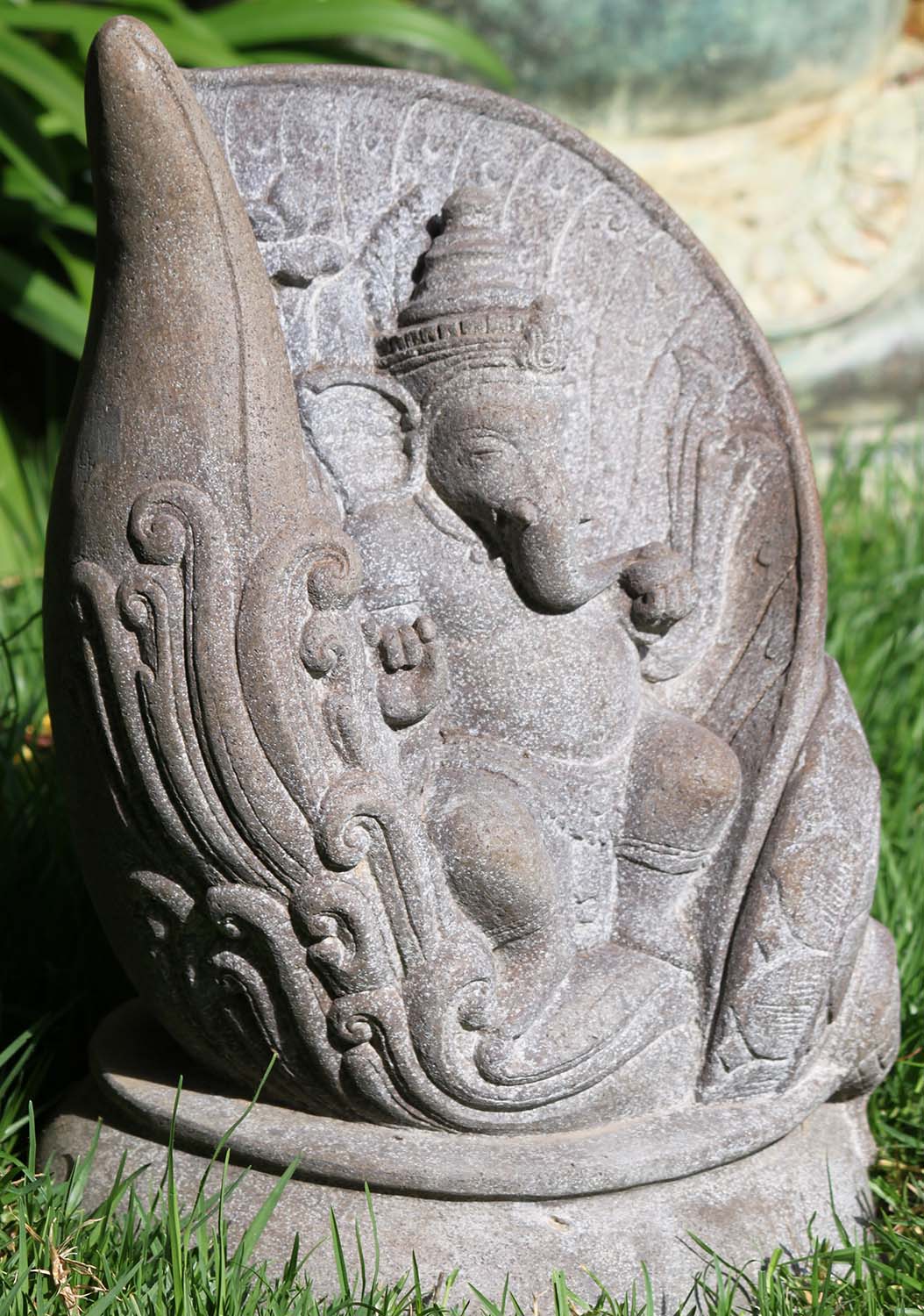 Stone Ganesha Dancing within Conch Shell 19"