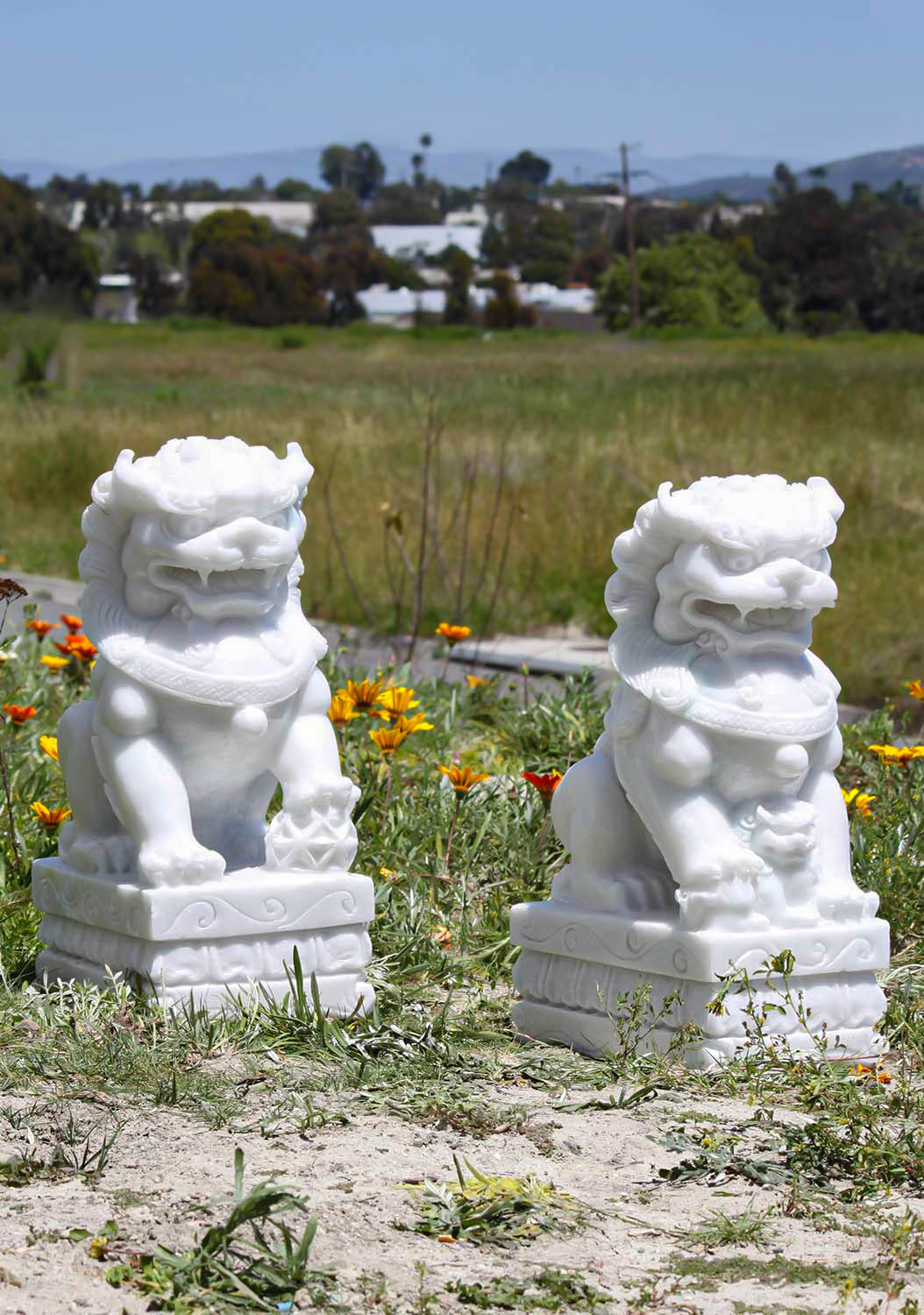 white foo dog statues