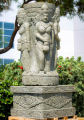 Stone Garden Planter or Bird Bath with 4 Devi Parvatis Carved in Bas-Relief with Base 55"