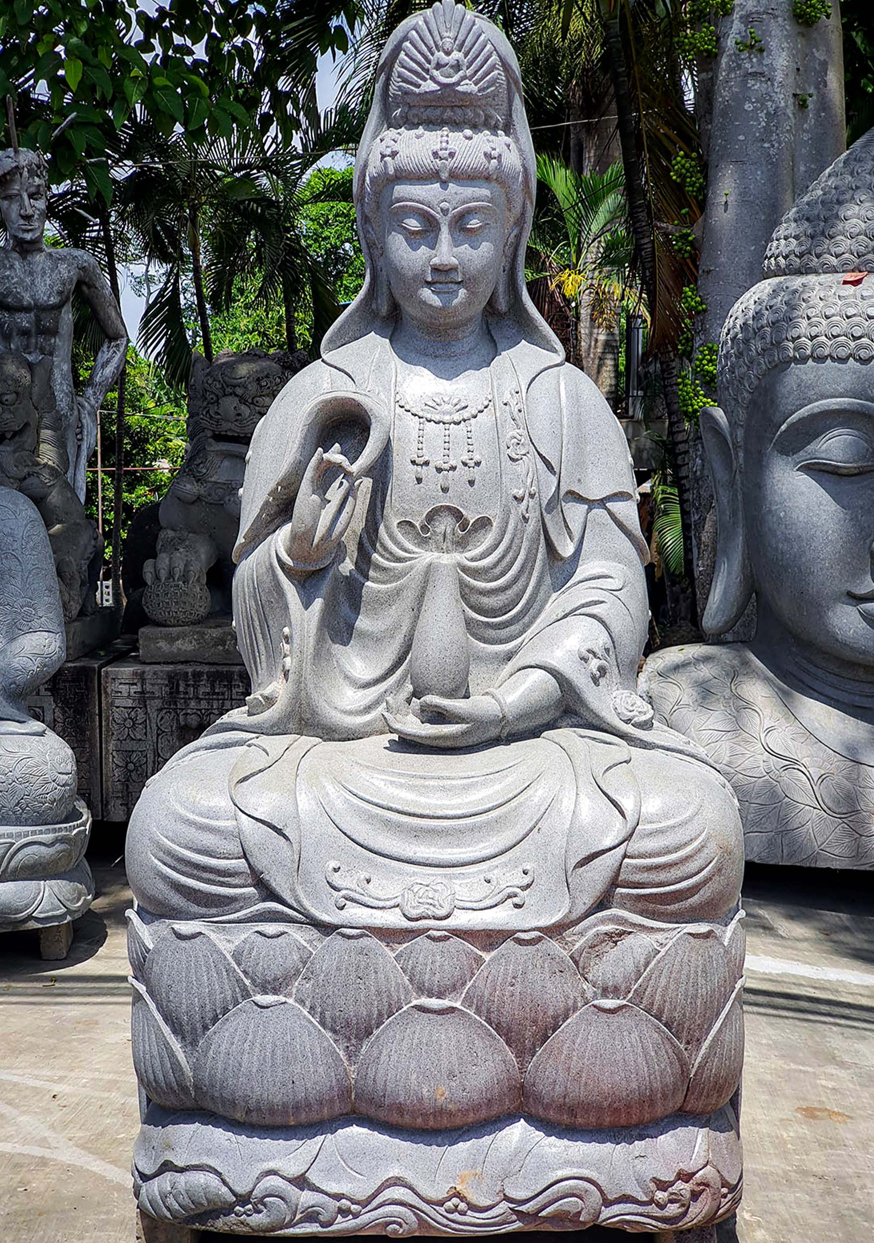 Large Hand Carved Stone Statue of the Bodhisattva Kwan Yin Seated on Lotus Base 73"