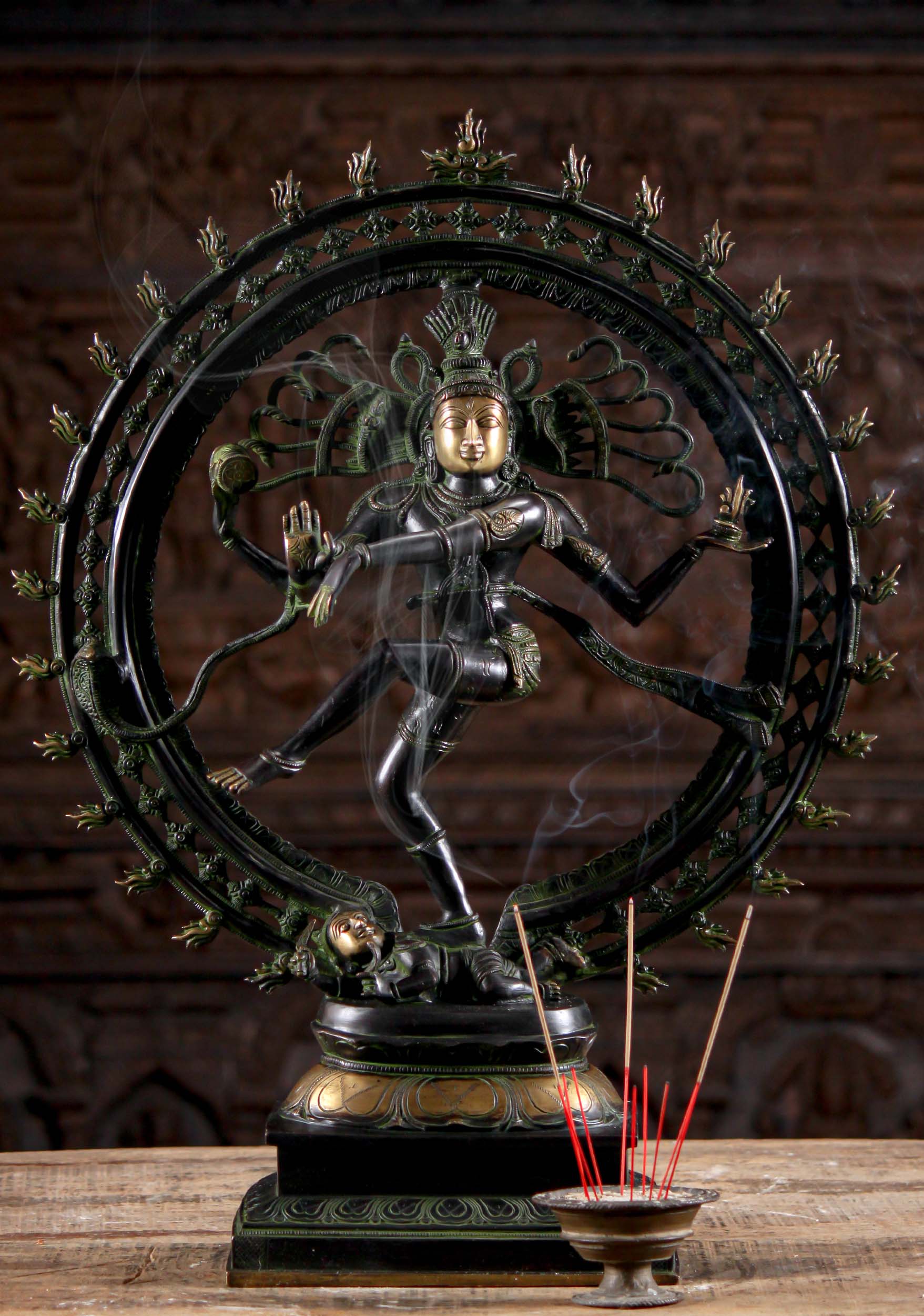 Dancing lord Shiva statue, Nataraja, in front of fire. Silhouette. India  Stock Photo - Alamy