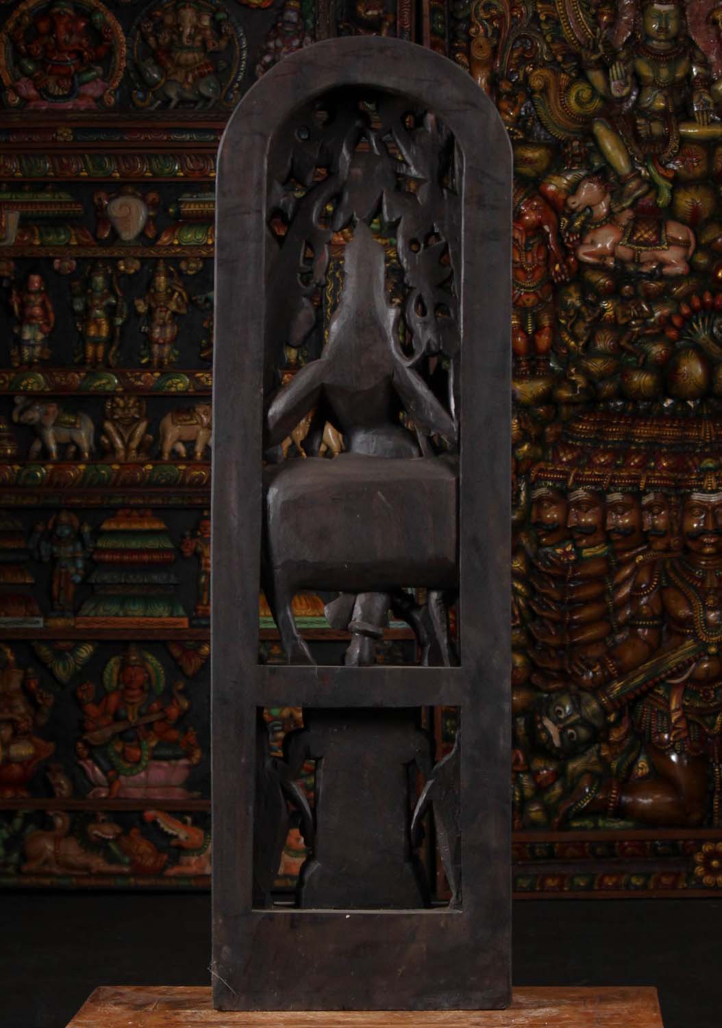 Wood Krishna Beneath Lush Canopy 48"