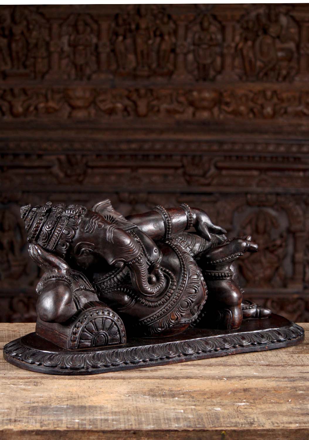 Dark Neem Wood Ganesh Statue in a Completely Relaxed Pose Reclining on a Pillow 29"