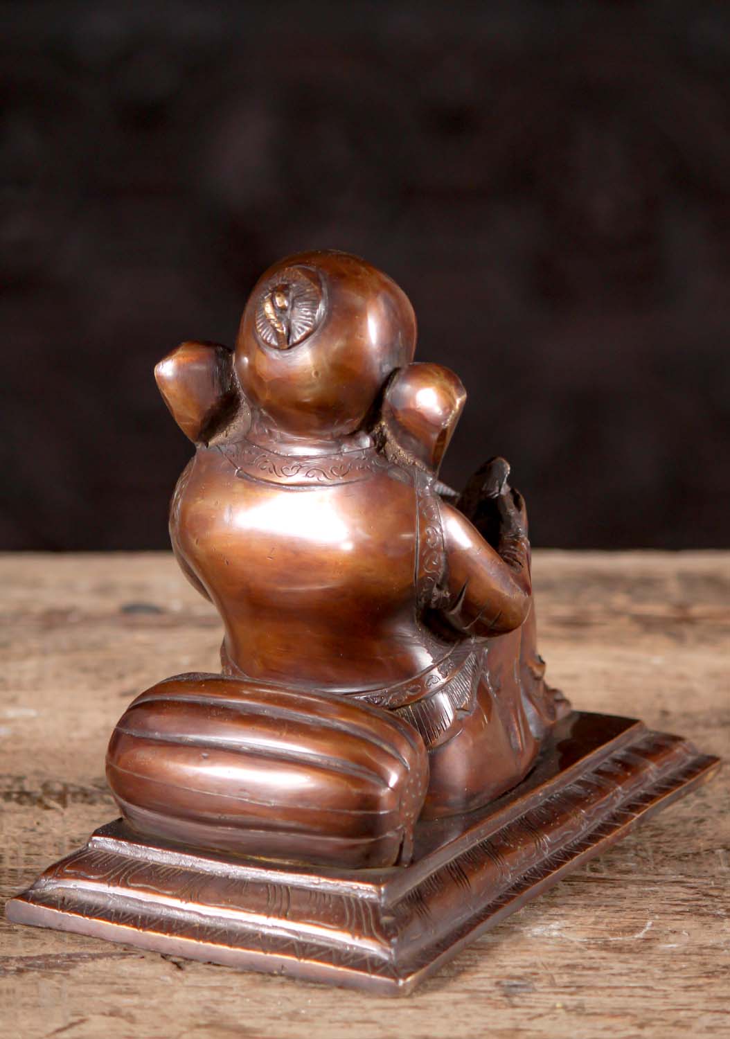 Brass Sculpture of Lounging Ganesha Resting on Pillow Reading a Book 8"
