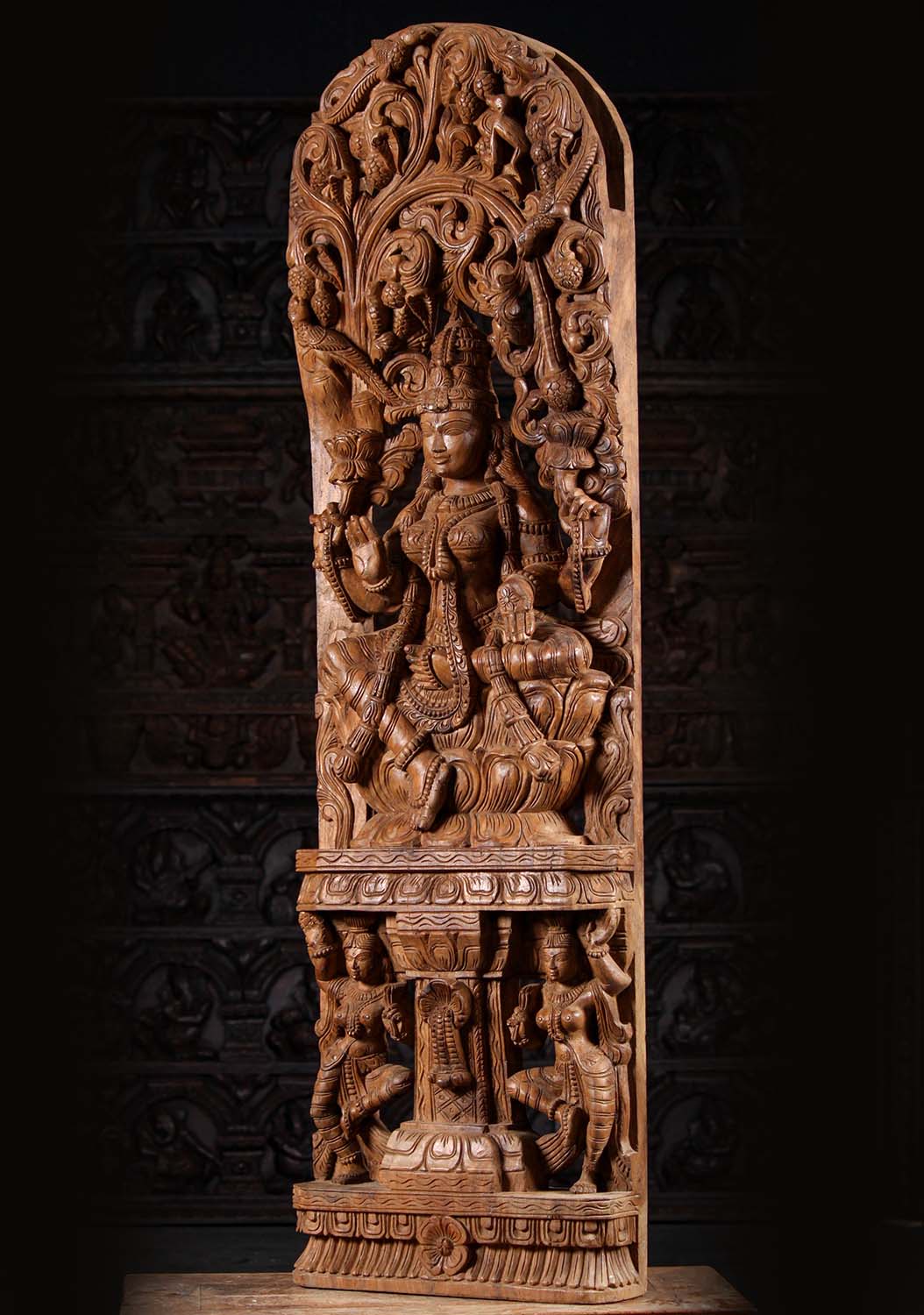 Light Wood Seated Abhaya & Varada Mudra Lakshmi Beneath Lush Canopy 60"