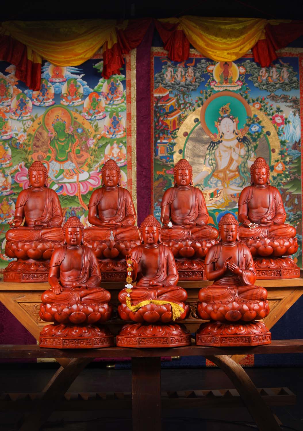 Set of Seven Hand Carved Wooden Seated Buddha on Lotus Base Holding Pearl of Wisdom 24"
