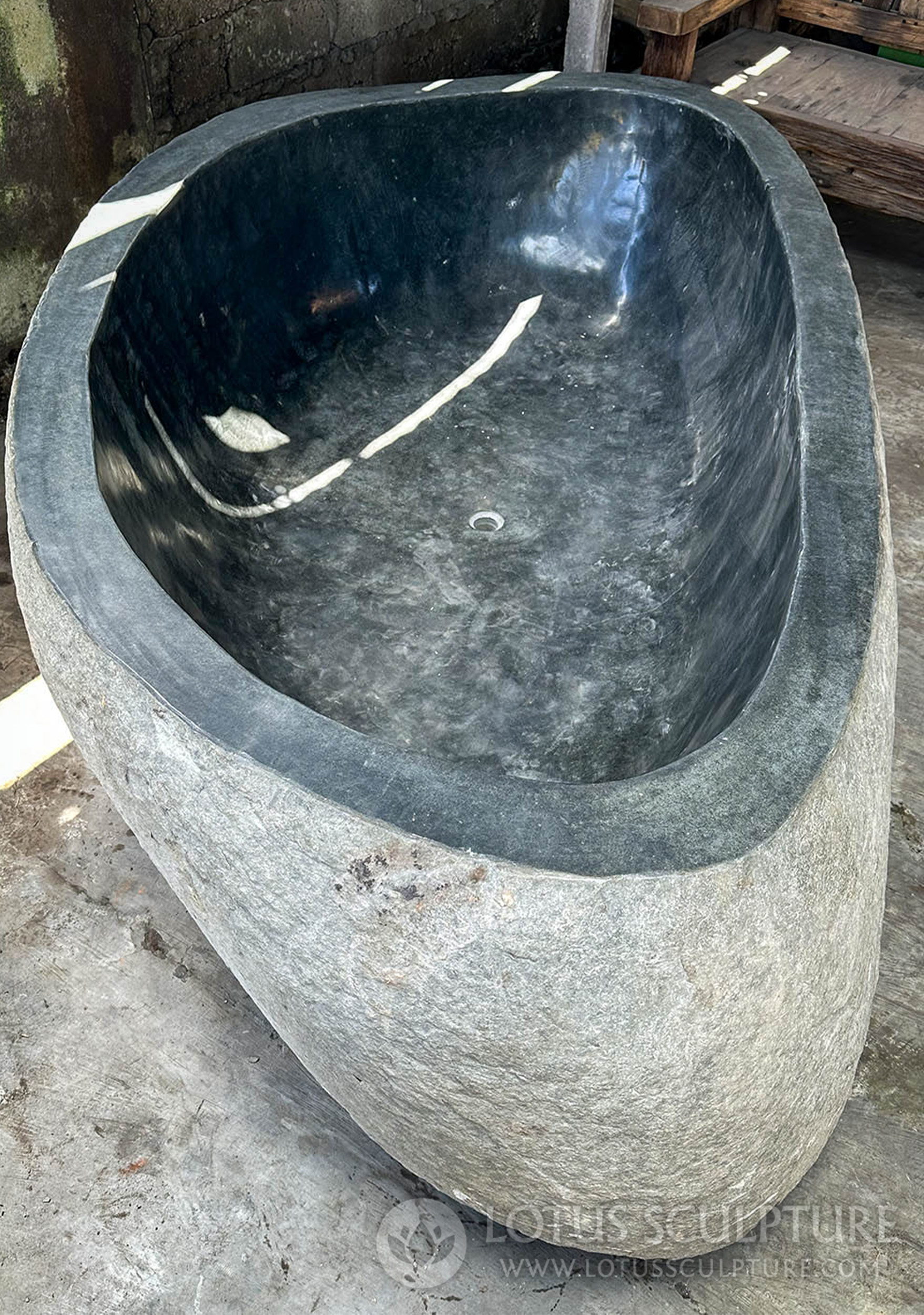 Carved Indonesian Oasis: Stone Bathtub with Artisanal Craftsmanship 102"