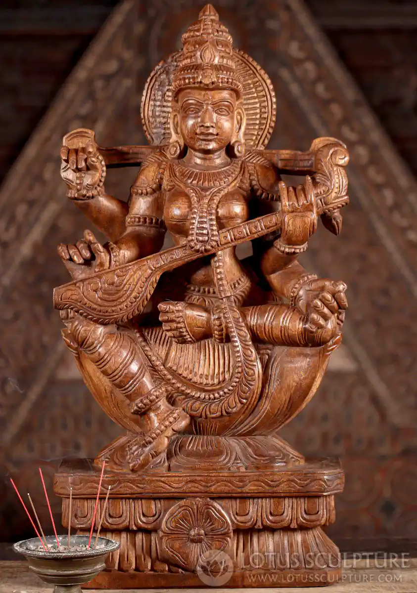 Saraswati Light Wood Sculpture Playing Veena, Holding Mala and Vedas on lotus Base 24"