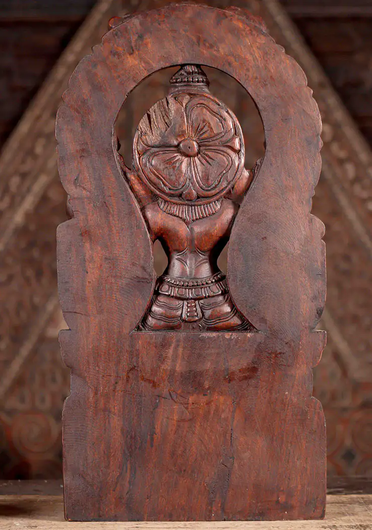Lakshmi Natural Wood Sculpture Seated Under Mahakala Arch in Abhaya and Varada Mudras 24"