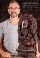 Lakshmi Natural Wood Sculpture Seated Under Mahakala Arch in Abhaya and Varada Mudras 24"