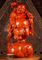 Hotei Buddha of Wealth Wood Sculpture with Crane and Wish Stick, on Gold Coins 31"