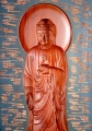 Buddha Wooden Wall Panel Concave Carving with Flowing Robes and Blue Background 46"