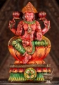 Lakshmi Hand-Painted Wood Statue in Abhaya and Varada Mudras Seated in Lalitasana 18"