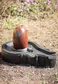 Narmada Shiva Lingam with Red and Grey Marbling on Black Stone Yoni Base 24"