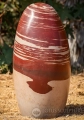 Large Narmada Shiva Lingam Stone with Rich Red and Pink Spiral Patterns 34"