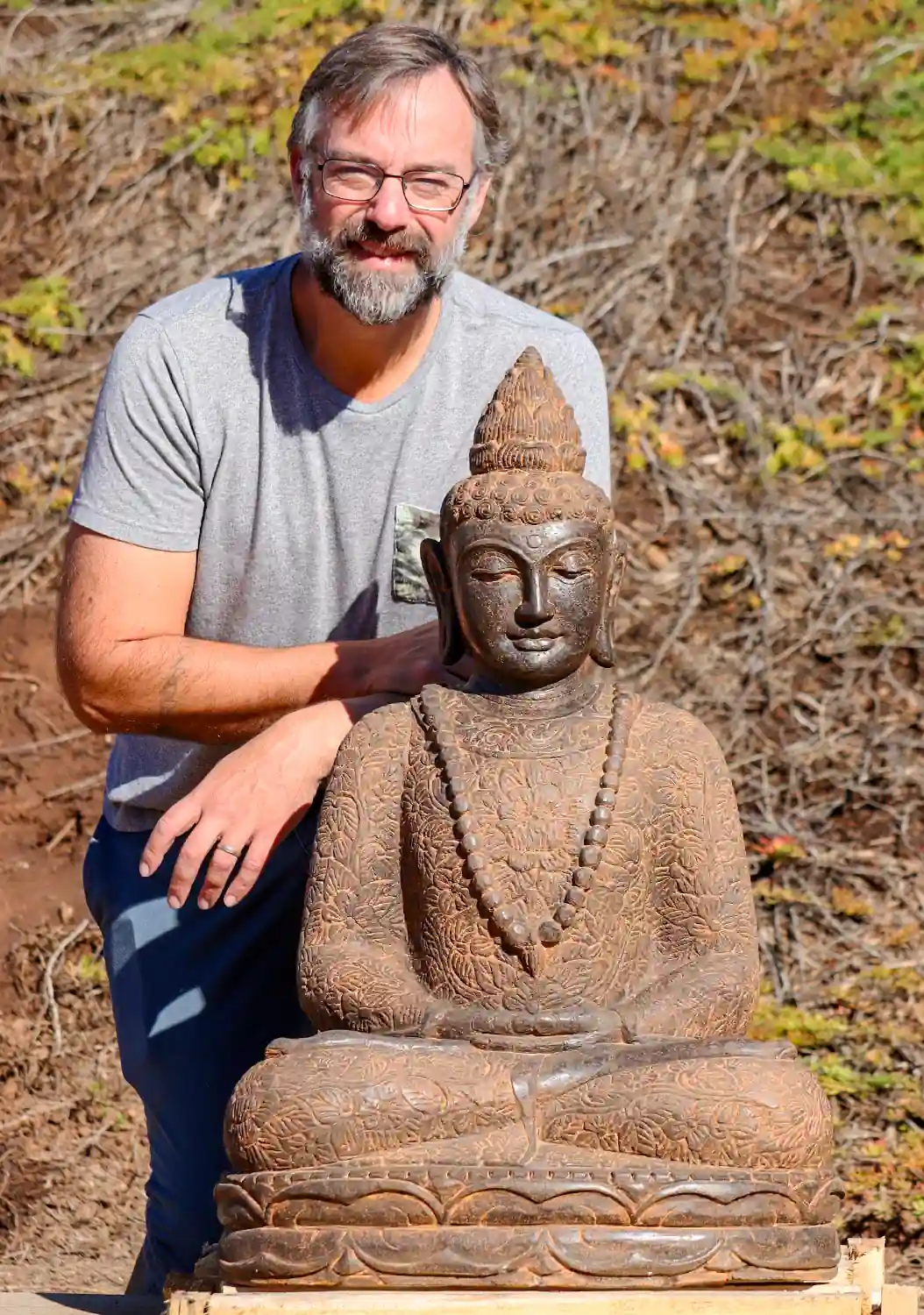 Buddha Lava Stone Sculpture, Meditating in Saffron Color with Brocade Robes 32"