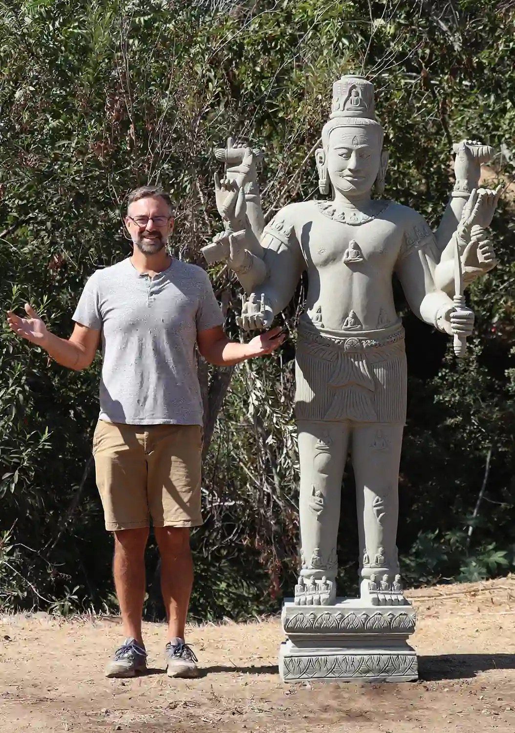 Vishnu Sandstone Sculpture with Buddhas, Eight-Arms in Standing Pose 92"