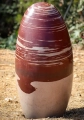 Large Narmada Shiva Lingam Stone with Rich Red and Pink Spiral Patterns 34"