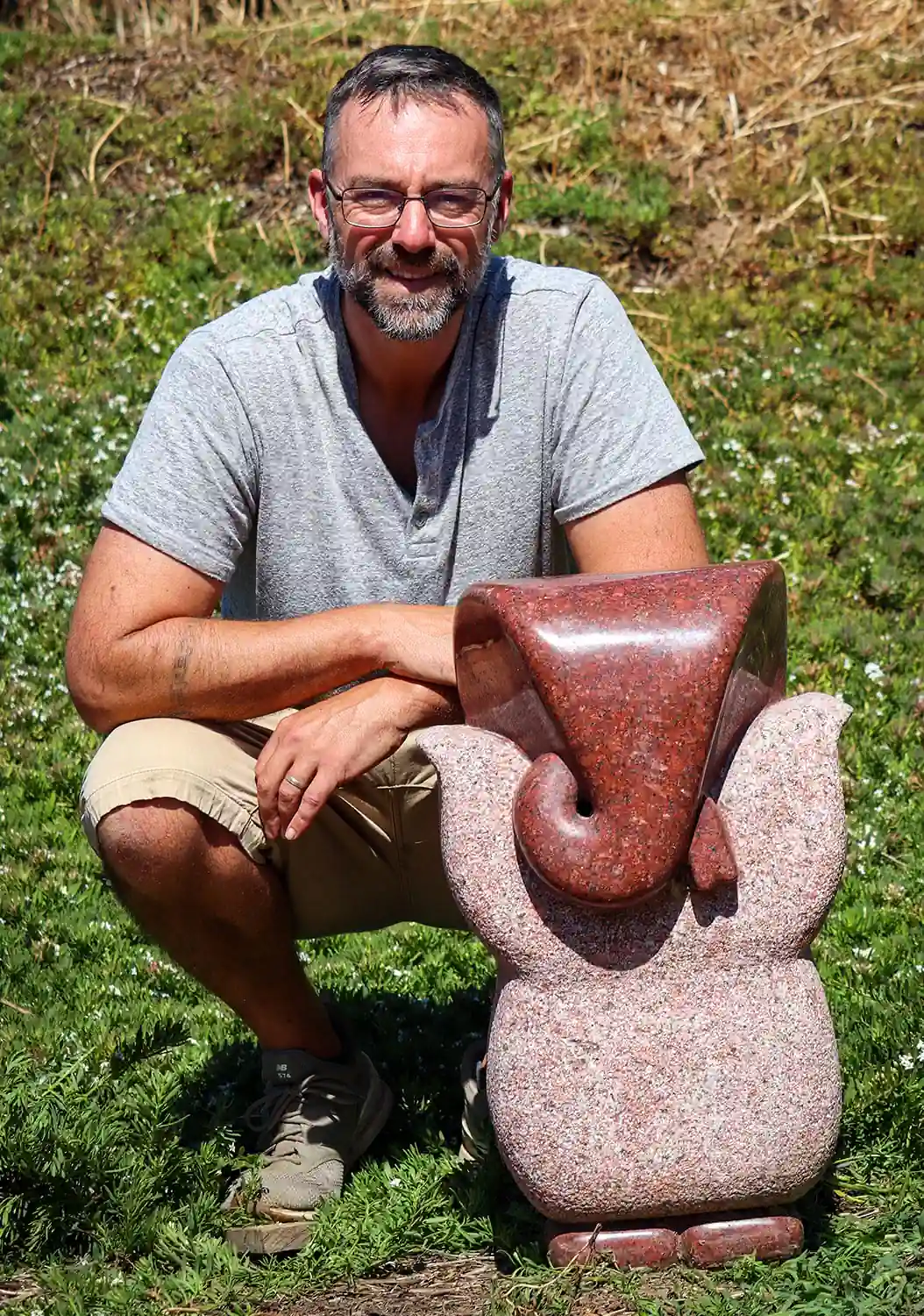 Ganesh Red Granite Abstract Garden Sculpture with Corkscrew Trunk South India 24"