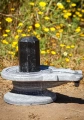 Shiva Lingam Octagonal Black Granite with Carved Black Marble Yoni Base, India 19"