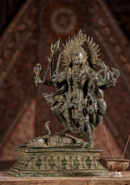 Kali Brass Statue Standing Over Shiva, Balinese Hindu Goddess with Weapons and Garland 16.5" Kali Brass Statue Standing Over Shiva, Balinese Hindu Goddess with Weapons and Garland 16.5"